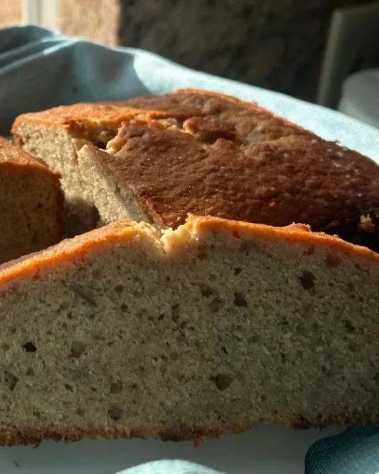 Banana bread loaves, one sliced open